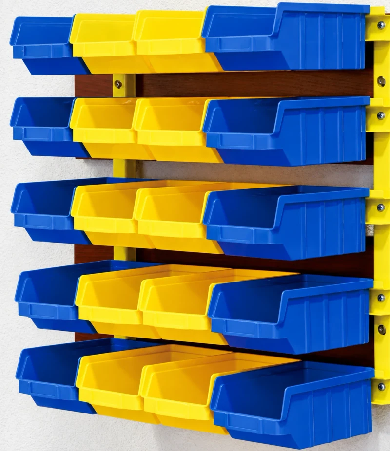 Bins on a wall panel — Hanging parts bins