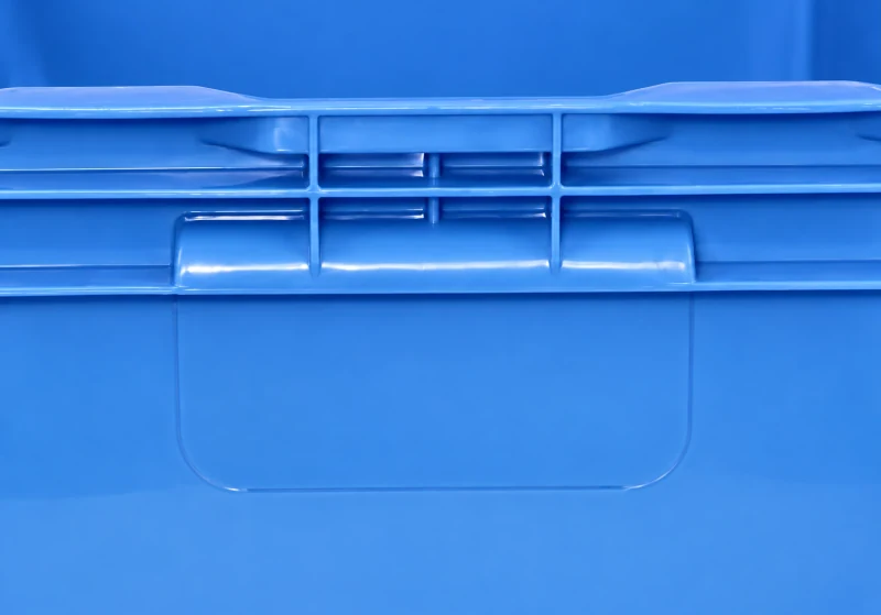 Molded handhold — HP stacking containers